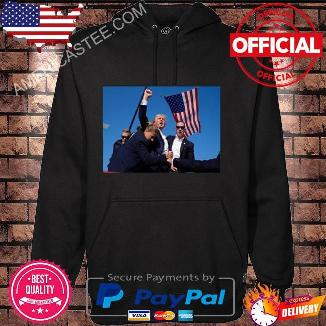 Trump being rushed off while pumping his fist after being shot in the ear at his rally shirt