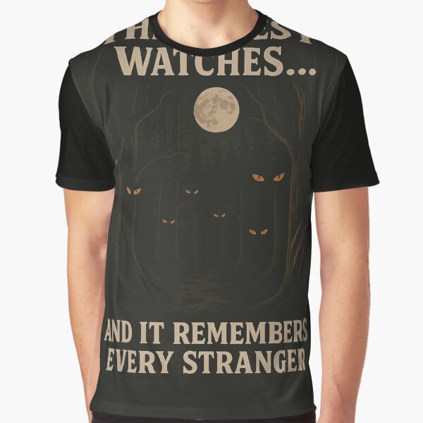 "THE FOREST WATCHES... AND IT REMEMBERS EVERY STRANGER" by Silent Watch Threads. T-Shirts, Hoodie, Sweatshirt (Image 1)