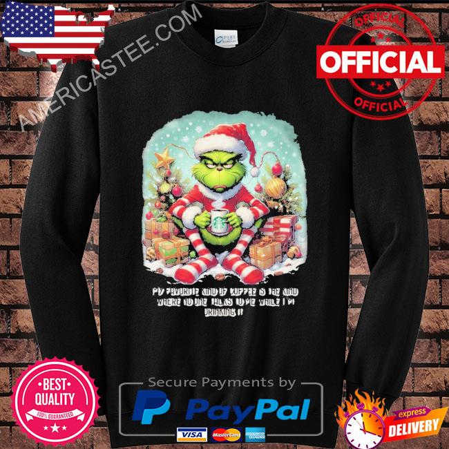Grinch drinks starbucks coffee in the Christmas holiday sweater