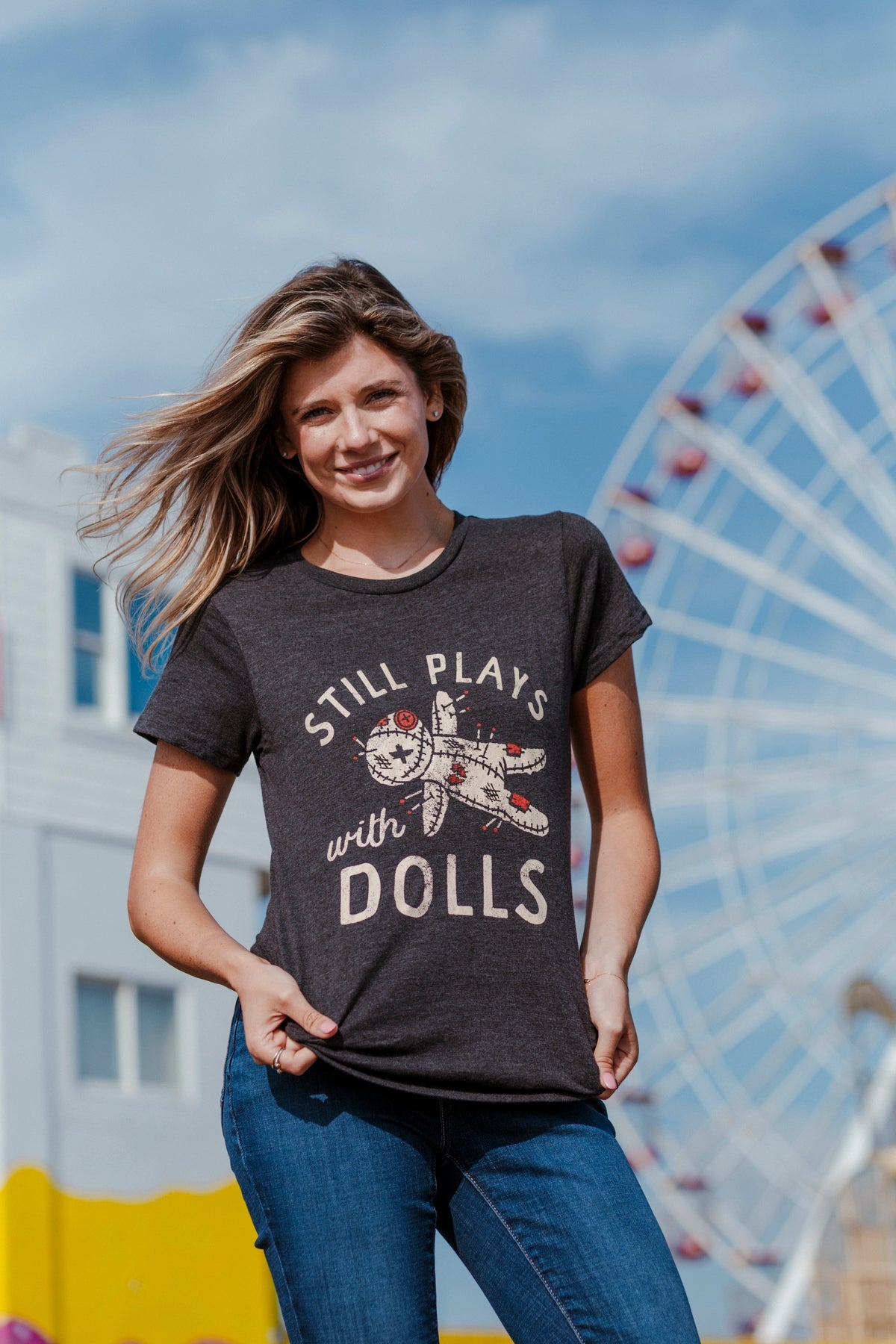 Still Plays With Dolls Women's T Shirt