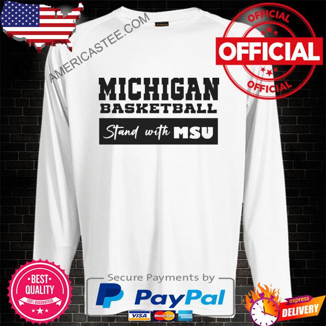 Michigan basketball stand with MSU shirt