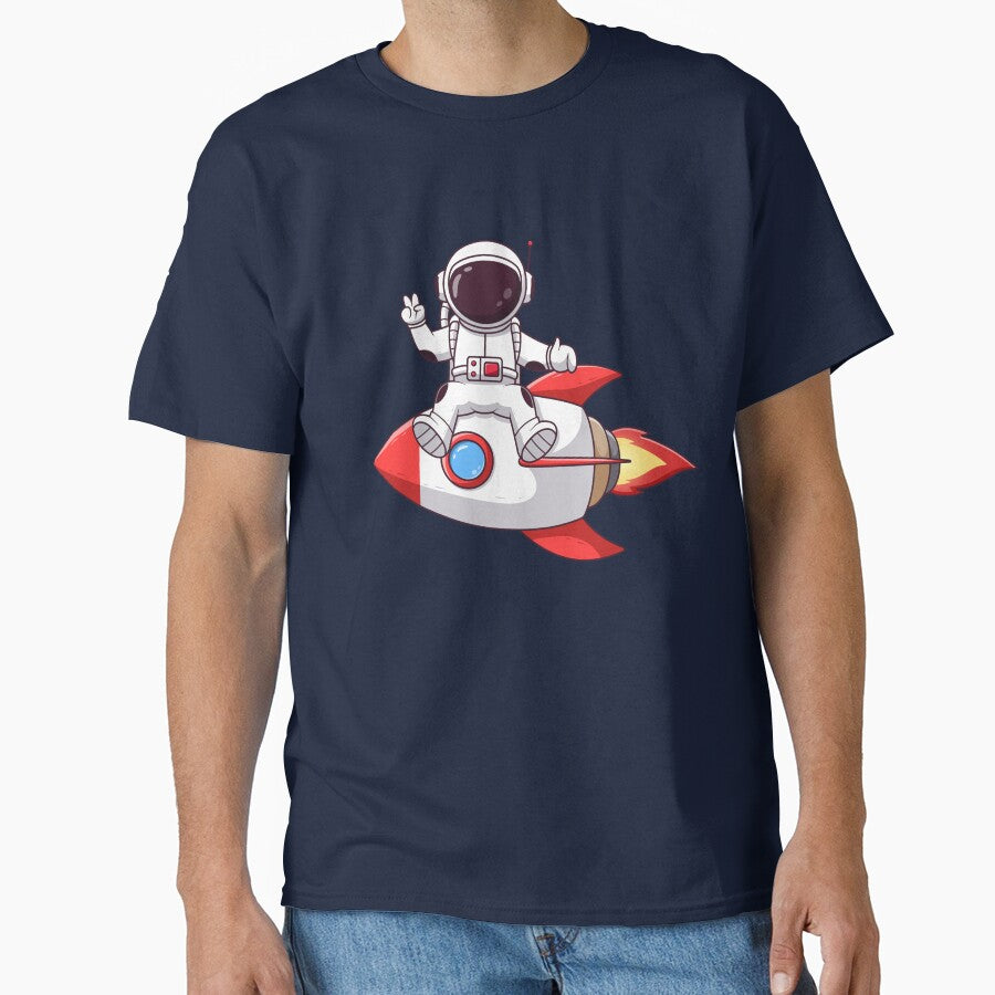 Cute Astronaut With Peaceful Hands Sitting on Rocket Cartoon by Berryl09 T-Shirts, Hoodie, Sweatshirt (Image 1)