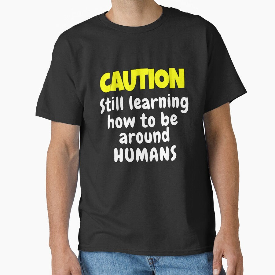 Funny Sarcastic Humor Caution Still Learning How To Be Around Humans by fantasticdesign T-Shirts, Hoodie,... (Image 1)