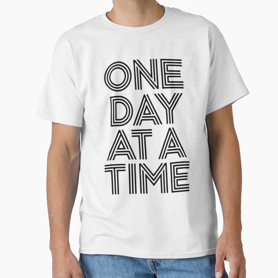 One Day At A Time – Minimal Typography Motivational Quote Design by DNDU_Design T-Shirts, Hoodie, Sweatshirt (Image 1)