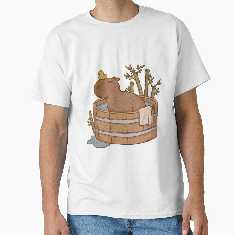 Capybara with rubber duck taking a bath in a wood tub surrounded by bamboo by Bianca Stancu T-Shirts, Hoodie,... (Image 1)