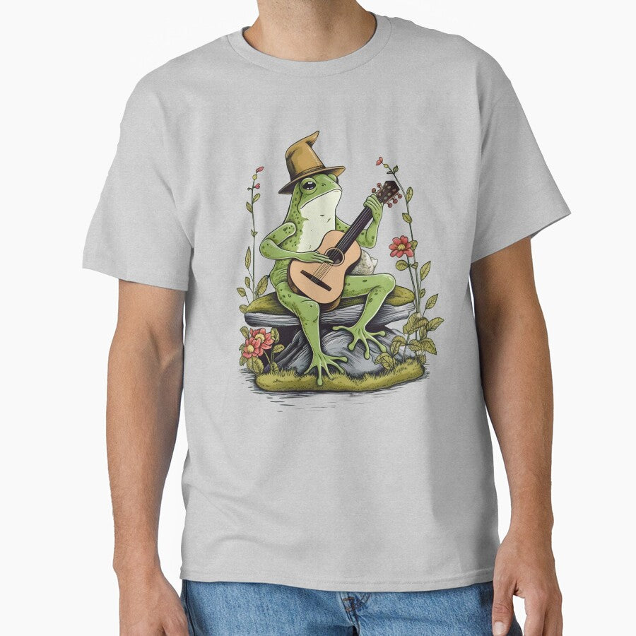 Cottagcore Aesthetic Frog Playing Guitar Banjo Graphic by sanadkarmakar T-Shirts, Hoodie, Sweatshirt (Image 1)