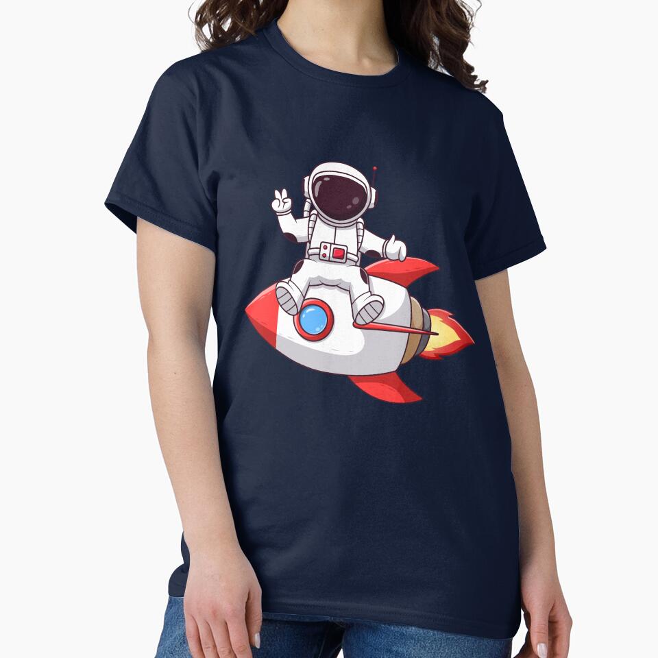 Cute Astronaut With Peaceful Hands Sitting on Rocket Cartoon by Berryl09 T-Shirts, Hoodie, Sweatshirt (Image 2)