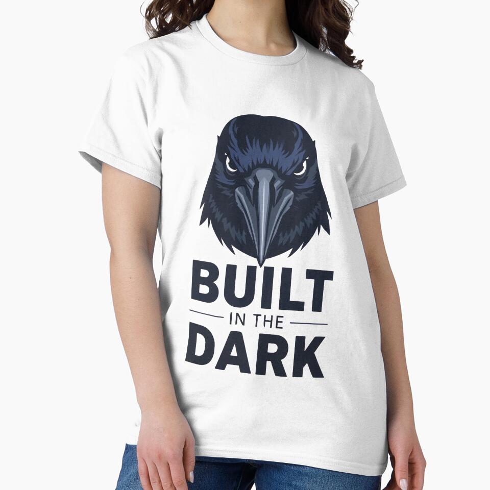 Built in the Dark – Raven Strength Graphic Tee by Purdiole-art