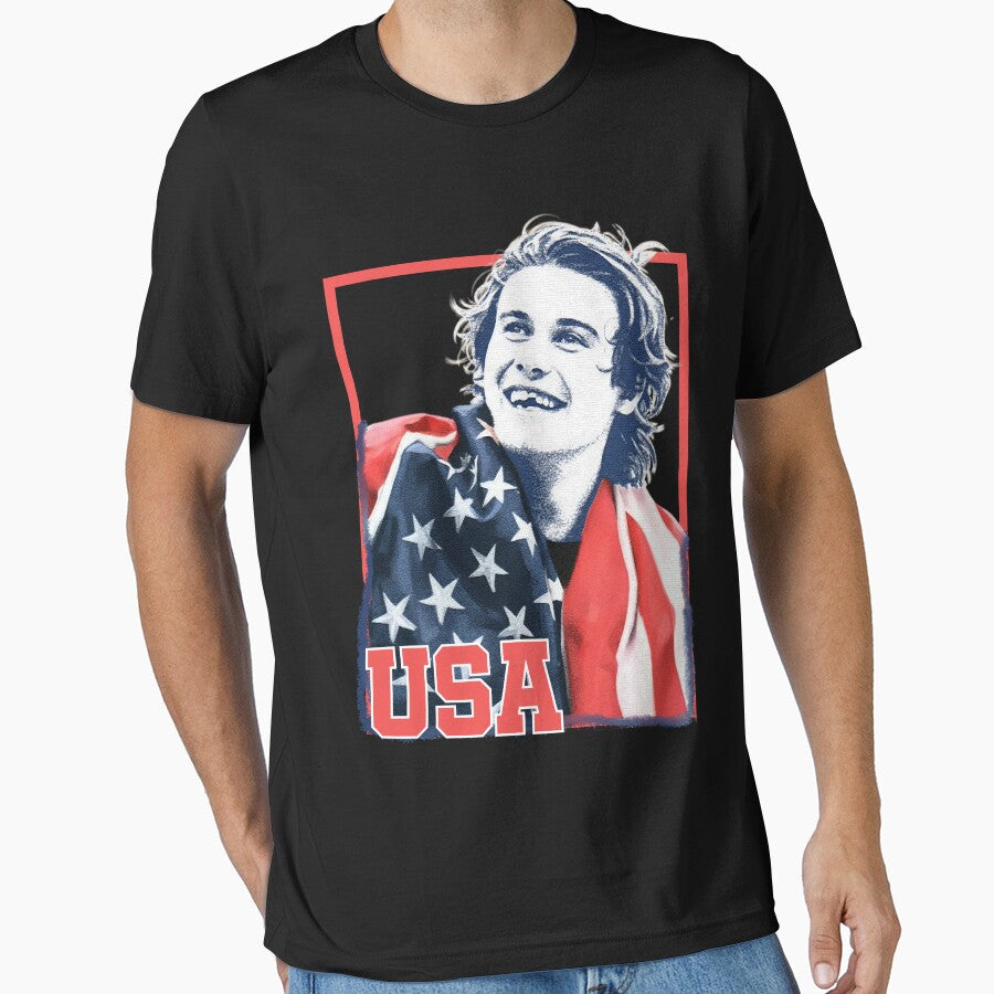 Jack Hughes-USA Hockey Olympics 2026 by ClarenceGarza T-Shirts, Hoodie, Sweatshirt | BlankRebels.com (Image 1)