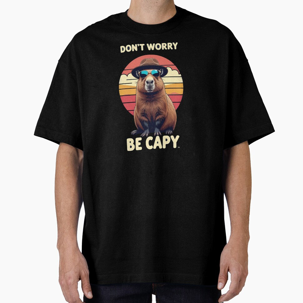 Don't Worry Be Capy – Funny Chill Capybara Retro Sunset Design by harry mac T-Shirts, Hoodie, Sweatshirt (Image 1)