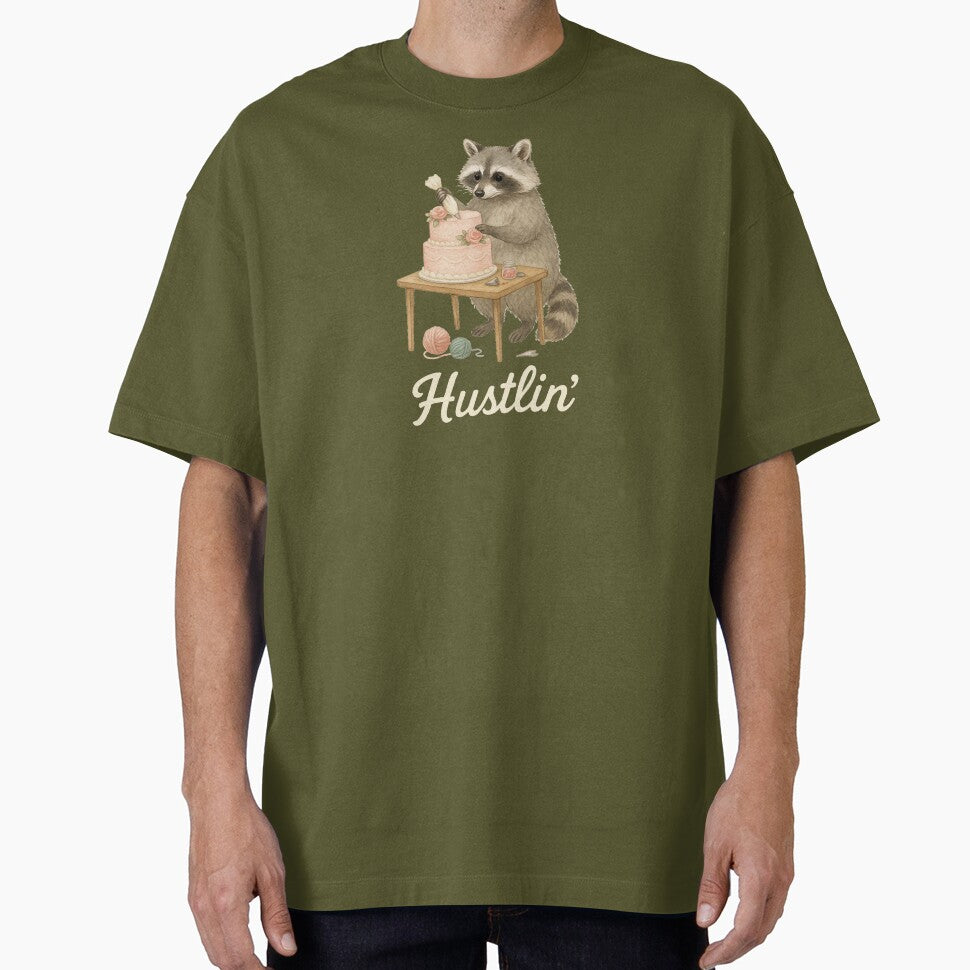 Raccoon Baker Hustlin' by thehaywirehoney T-Shirts, Hoodie, Sweatshirt | BlankRebels.com (Image 1)