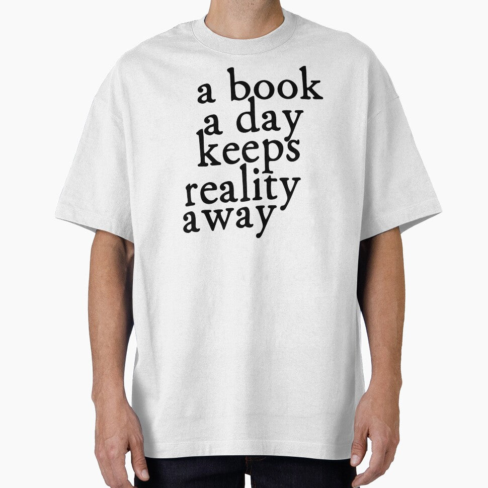 A Book A Day Keeps Reality Away T-Shirt & Stickers (Image 1)