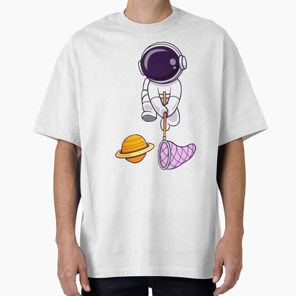 astronaut catching a planet with a fishing net cartoon Art. by BEAUTY ⭐⭐⭐⭐⭐ T-Shirts, Hoodie, Sweatshirt (Image 1)
