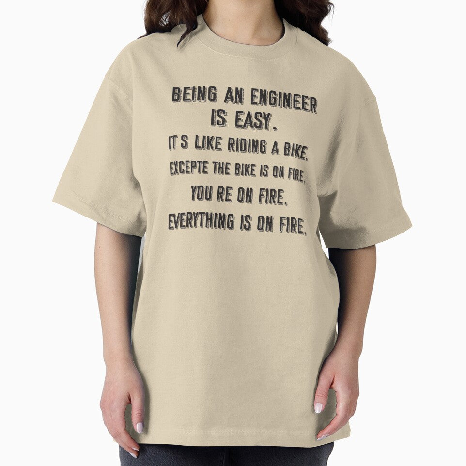 Being an engineer is easy. it's like riding a bike. excepte the bike is on fire. you're on fire. everything is... (Image 2)