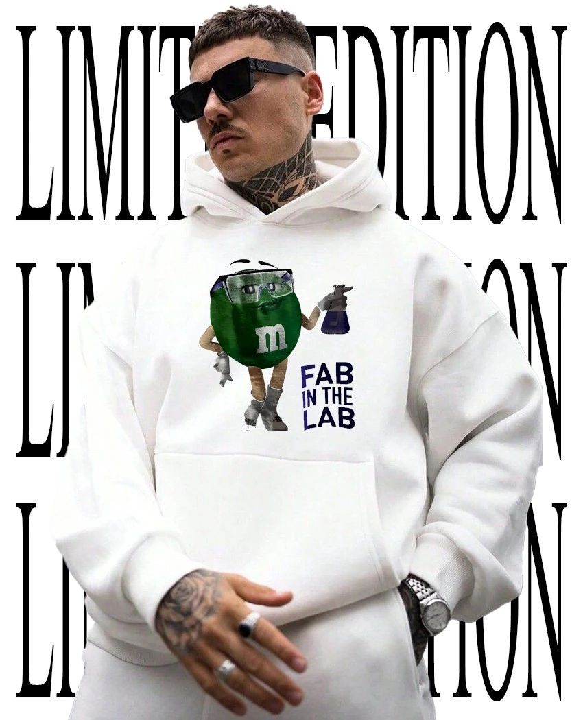 M and M’s Ms Green fab in the lab holding beaker wrench caricature shirt